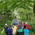 PrePrimary Group walking on a trail in the forest